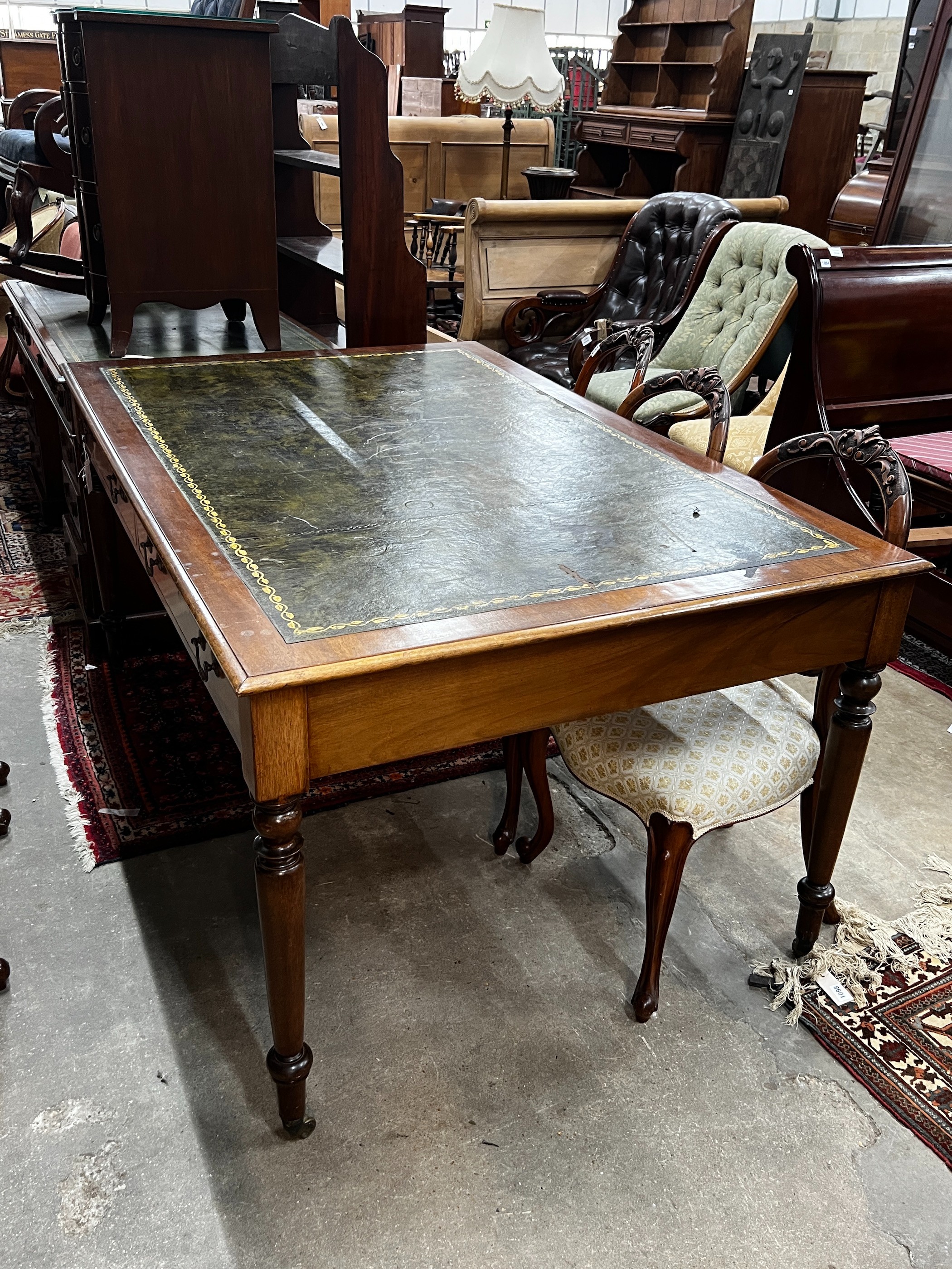 A Victorian style mahogany partner's writing table, width 154cm, depth 102cm, height 79cm